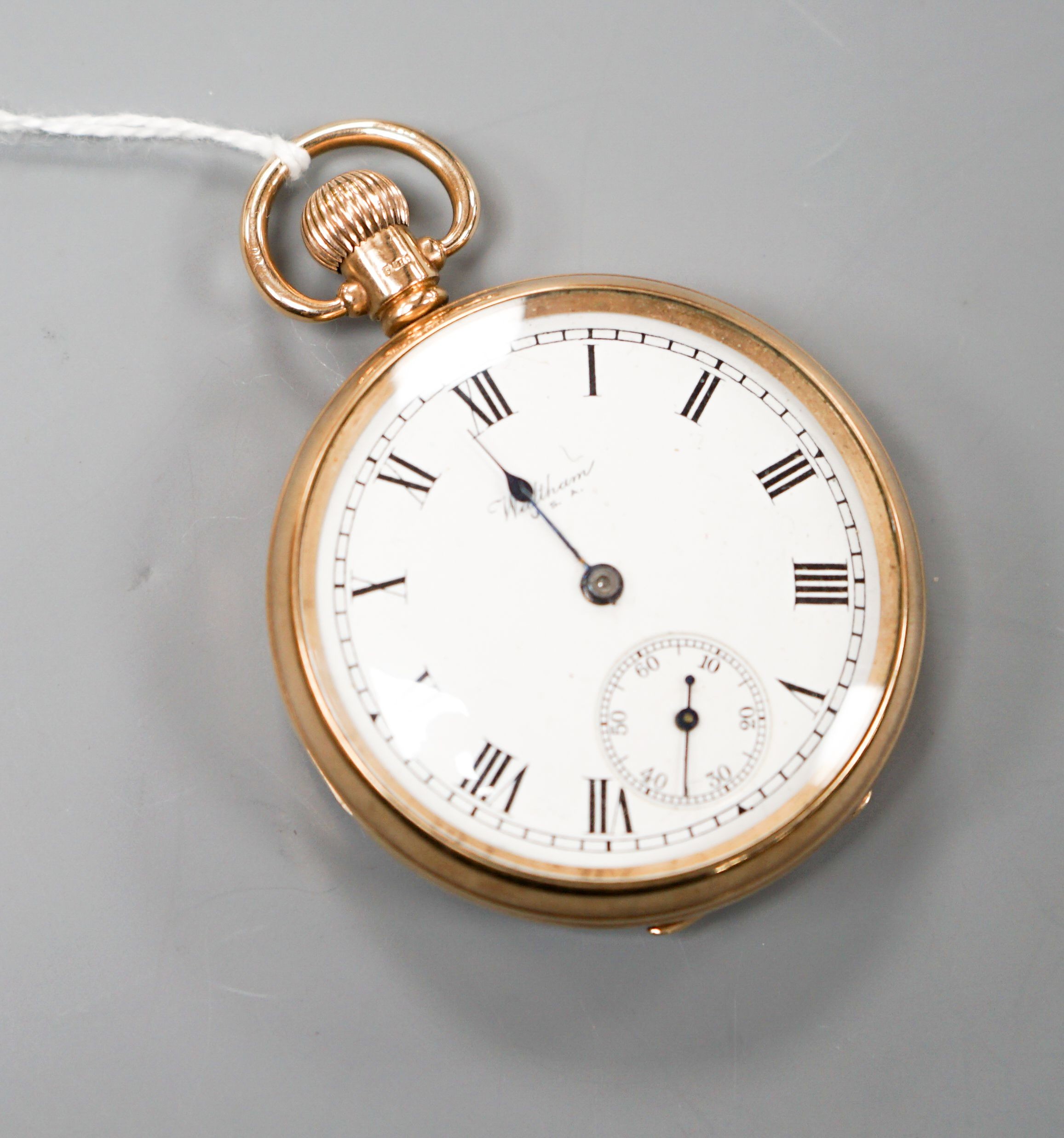 A 9ct gold open face Waltham keyless pocket watch, with engraved monogram, case diameter 50mm, gross weight 83.2 grams.